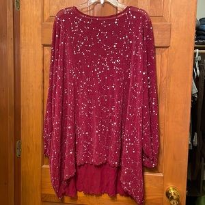 Oversized sheer tunic with silver star details.
